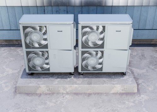 Square FRP cooling tower units installed at an industrial facility in Delhi