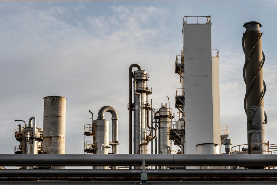 Industrial cooling and processing plant with tall towers and pipelines