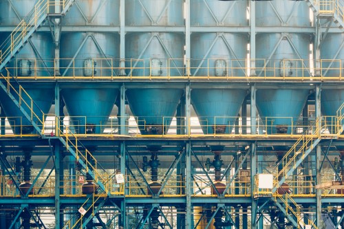 Industrial cooling tower equipment and steel structures at a manufacturing facility in Delhi